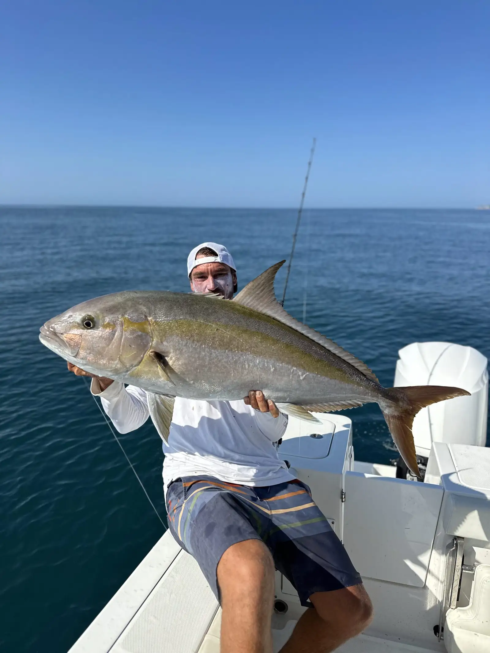 Playita clients with their catch